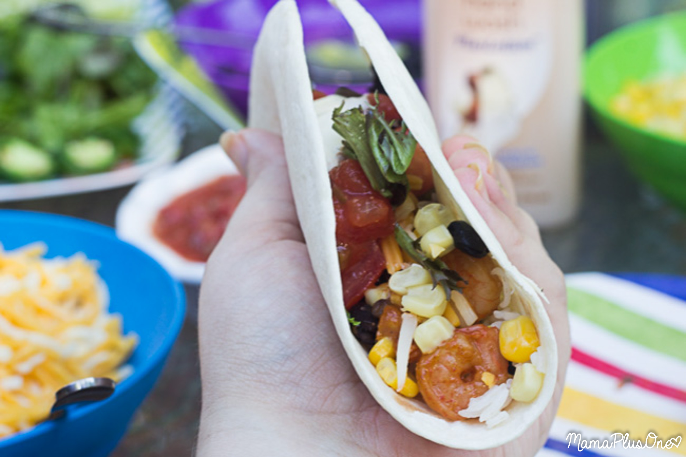 Nothing beats family memories and traditions. That's why I love cooking with my family every year on our annual summer vacation. For me, trips to the Gulf mean time spent with family, and fresh flavor, including the flavors at my favorite beach restaurant. I'm re-creating that Gulf flavor in my Midwest home with these easy Shrimp tacos the whole family will love! [ad]